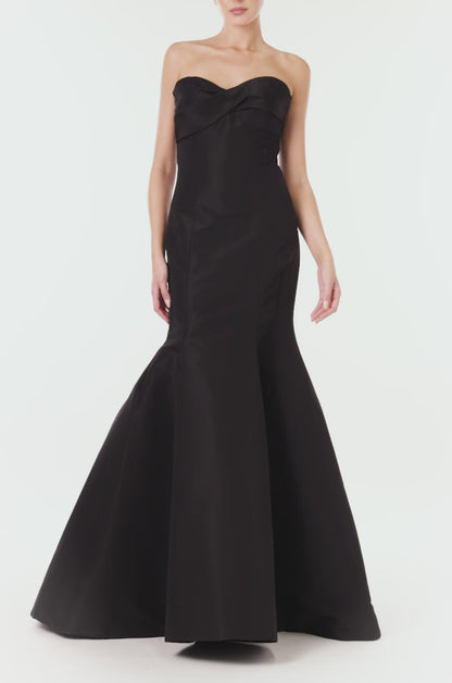 Monique Lhuillier black silk faille strapless gown with mermaid skirt.