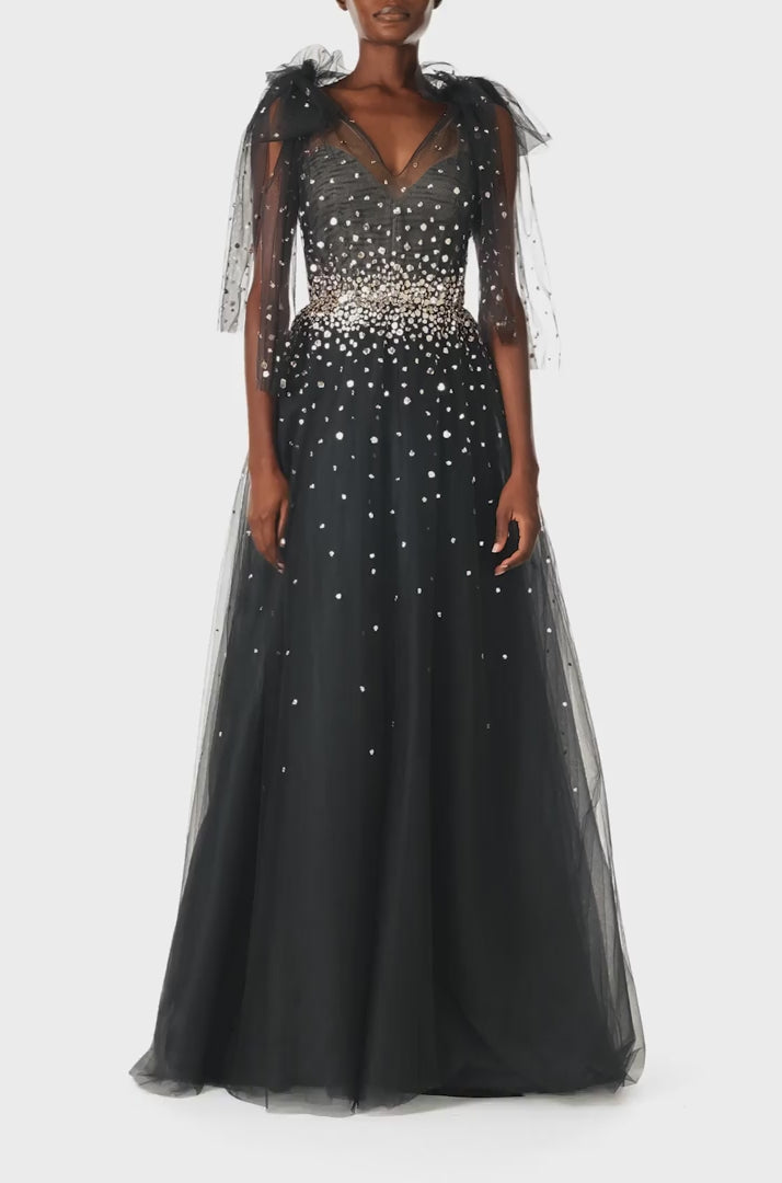 Monique Lhuillier Noir tulle ballgown with bow shoulder ties, V-neckline and gold embroidery - video.