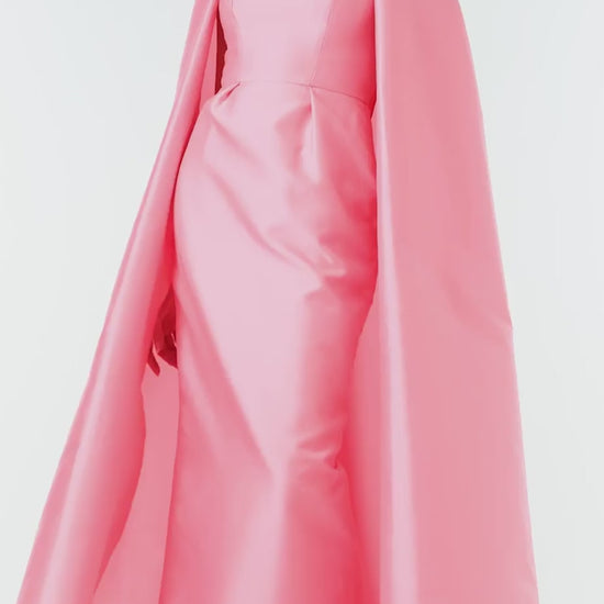 Monique Lhuillier Fall 2024 Dahlia pink mikado, sleeveless column gown with scoop neckline and attached cape - video.