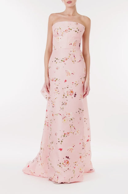 Monique Lhuillier strapless column gown in pink peony flora gazar fabric with tufted bustle train.