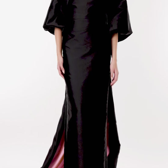 Monique Lhuillier draped cocoon evening jacket in black faille shown with the strapless column gown in black and pink.
