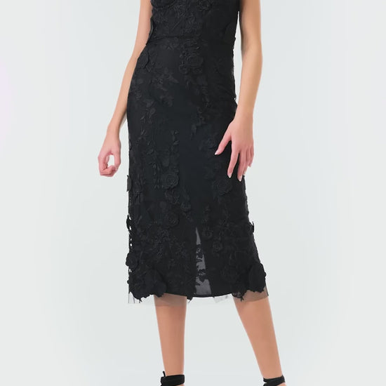 Monique Lhuillier Fall 2024 spaghetti strap lace midi dress with corseted bodice in Noir 3D lace- video.