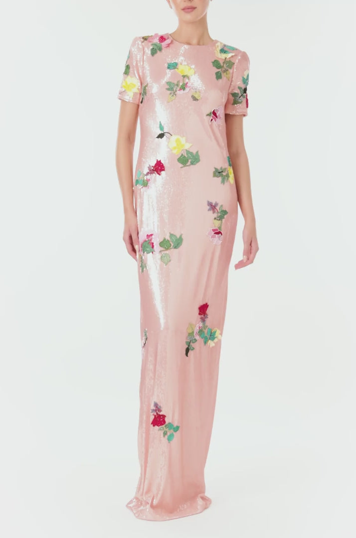 Monique Lhuillier Spring 2024 melon colored sequin gown with short sleeves, jewel neckline and multi-color floral embroidery - video.
