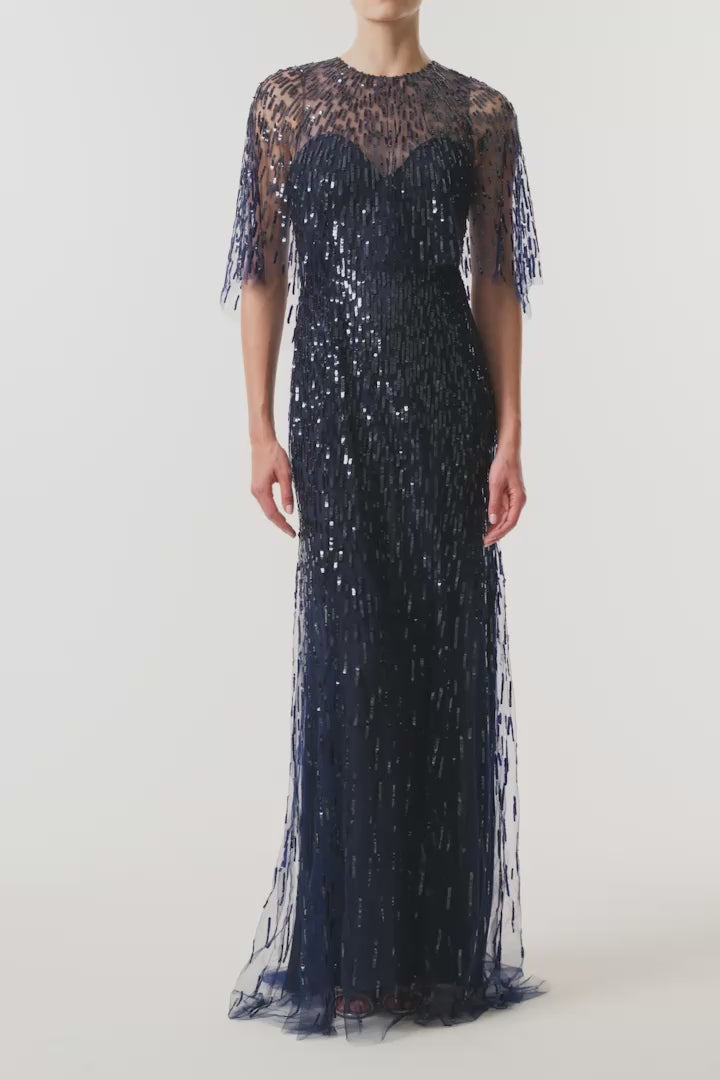 Monique Lhuillier Fall 2026 Navy and Sequin embroidered tulle Embroidered Gown with Capelet - video.
