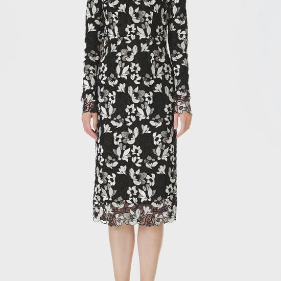 Monique Lhuillier Spring 2025 long sleeve sheath dress in noir silk white floral lace - video.