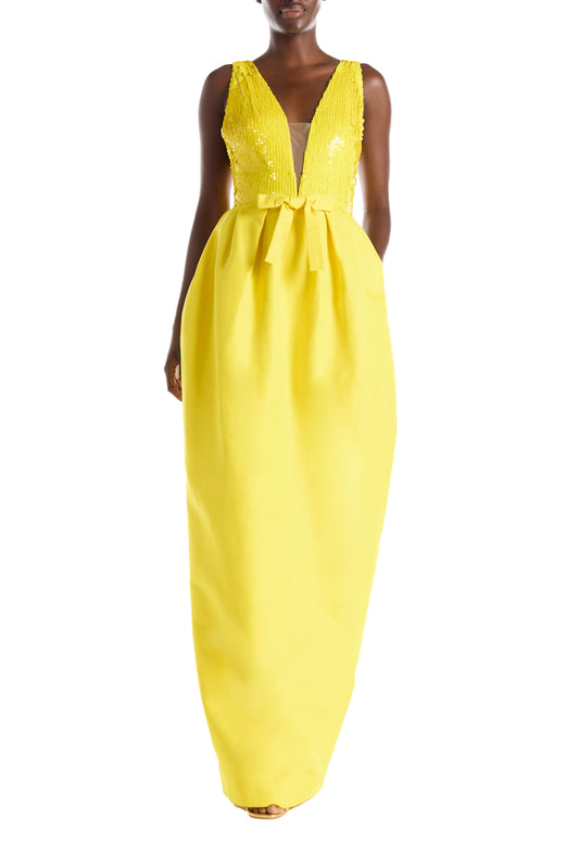 Yellow silk faille floor length gown with sequin bodice and illusion neckline.