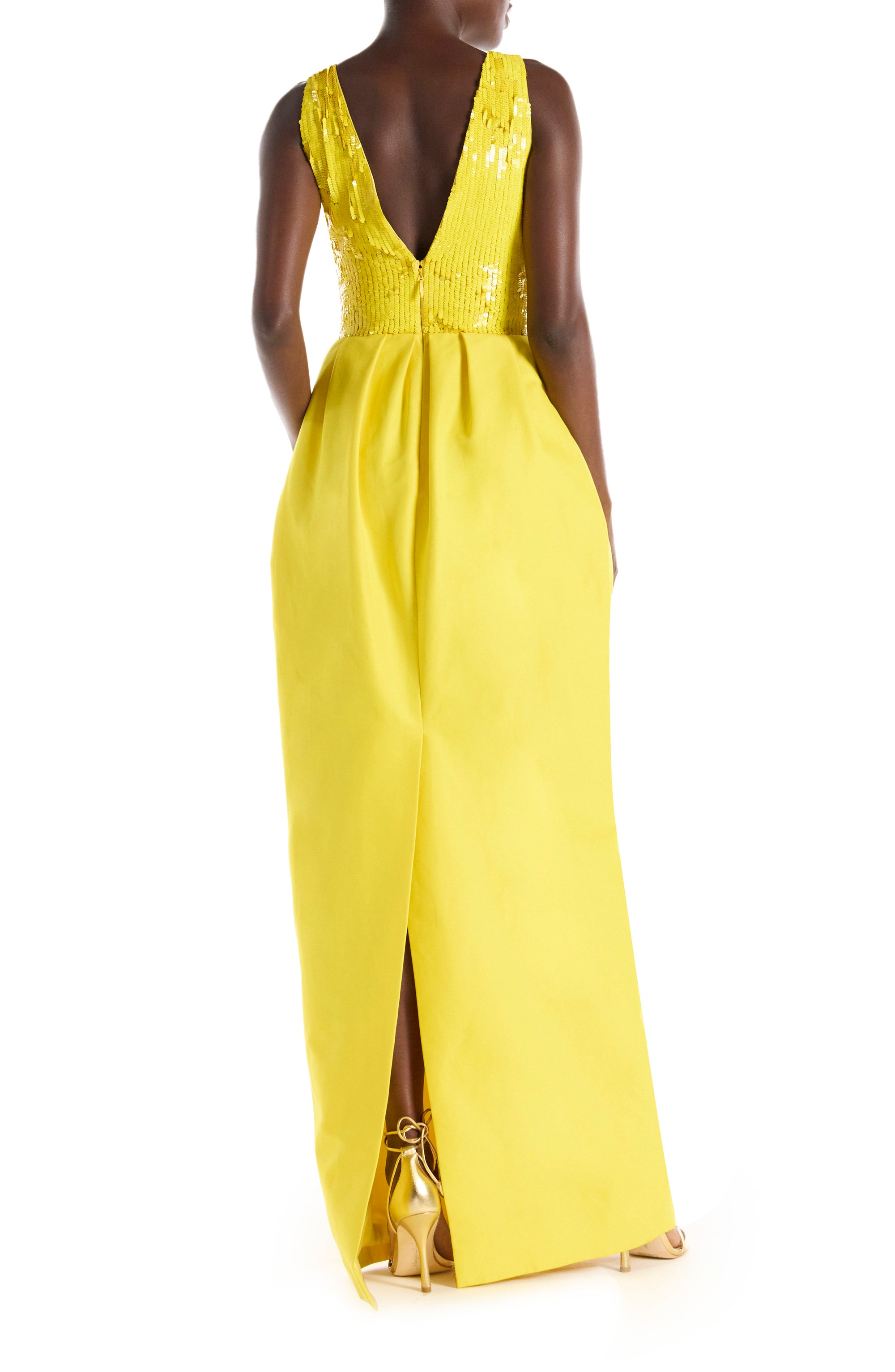 Yellow silk faille floor length gown with sequin bodice and illusion neckline.