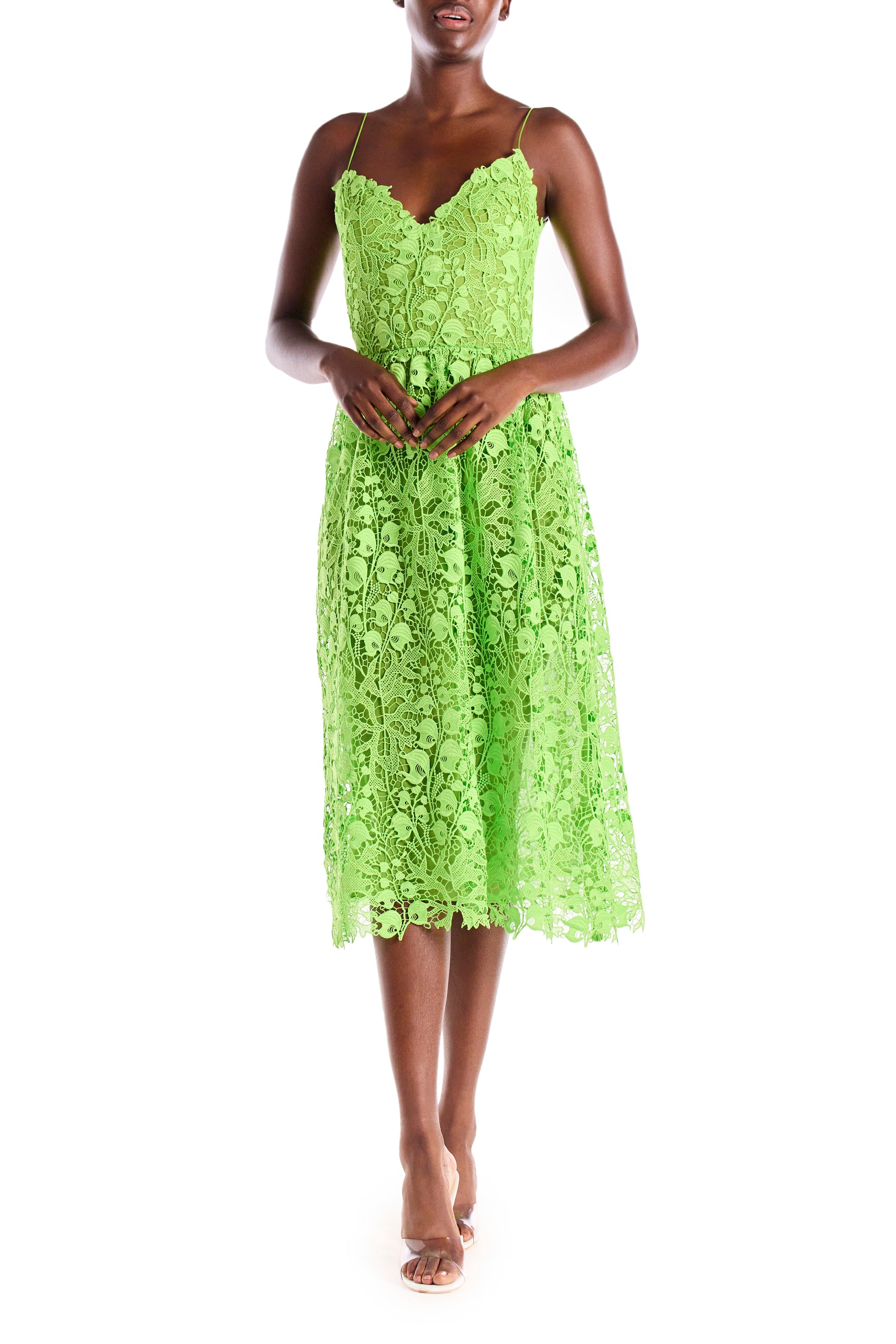 Lime green lace dress with spaghetti straps and midi length.