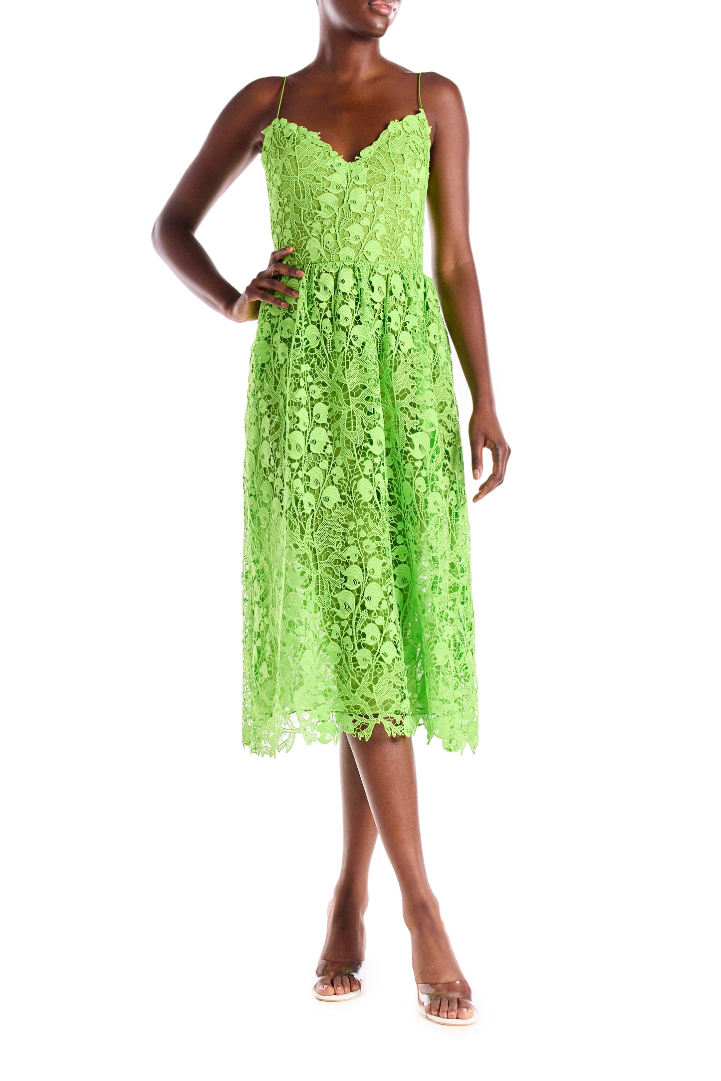 Lime green lace dress with spaghetti straps and midi length.