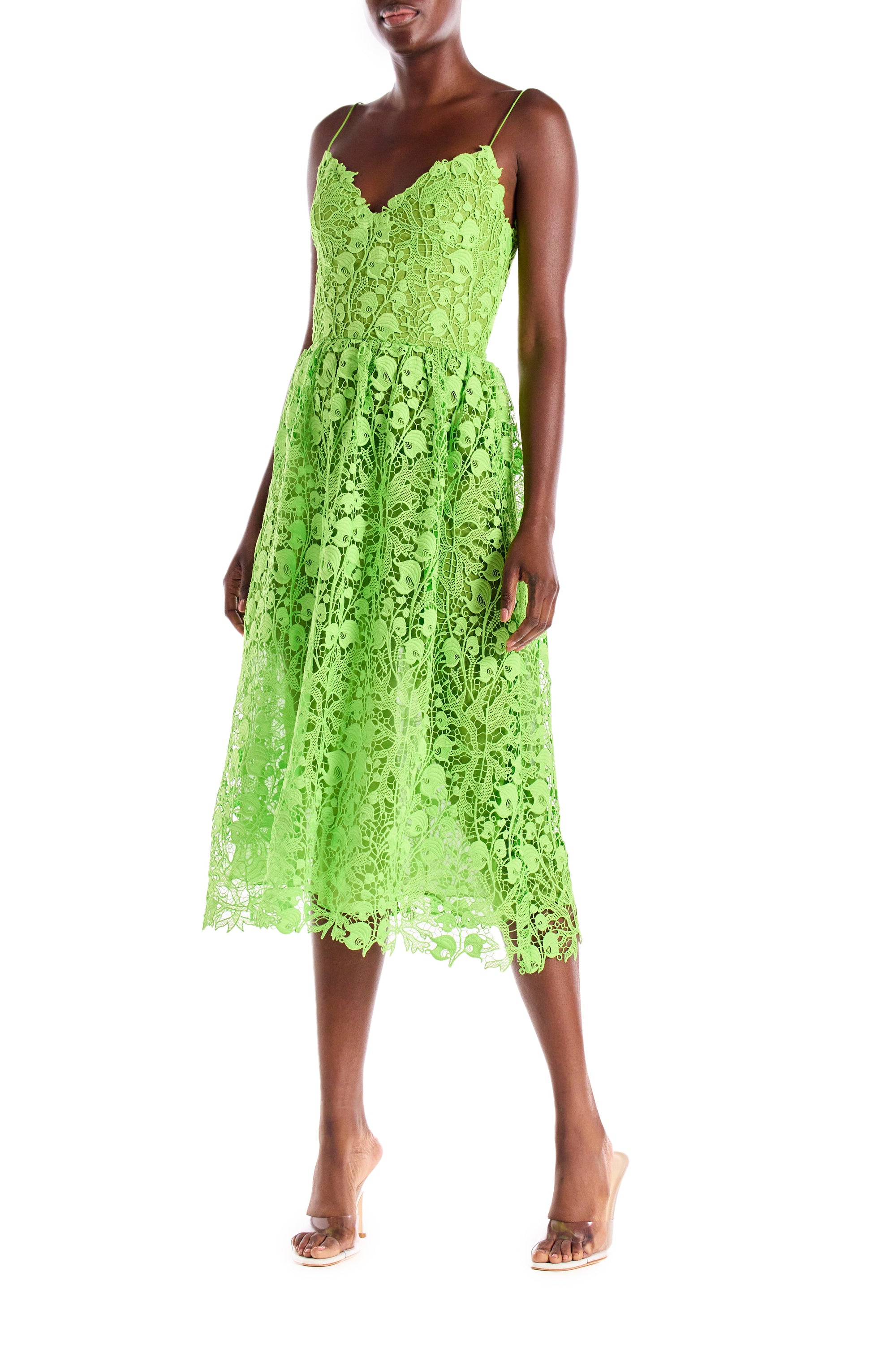 Lime green lace dress with spaghetti straps and midi length.