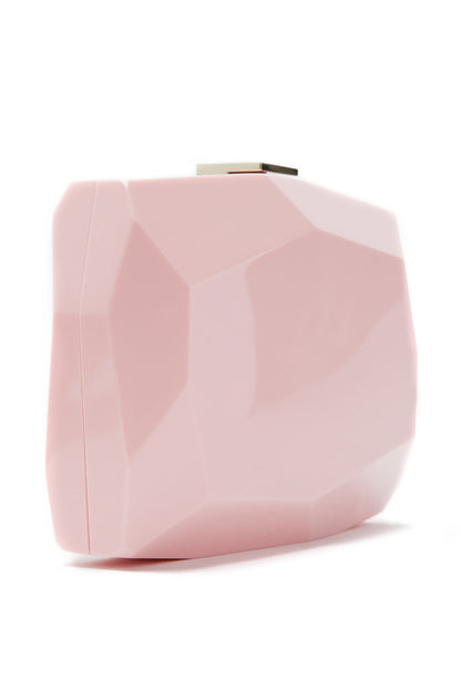 Lucite faceted minaudière with metal clasp at top in Peony Pink- side