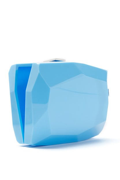 Lucite faceted minaudière with metal clasp at top in Sky Blue- open